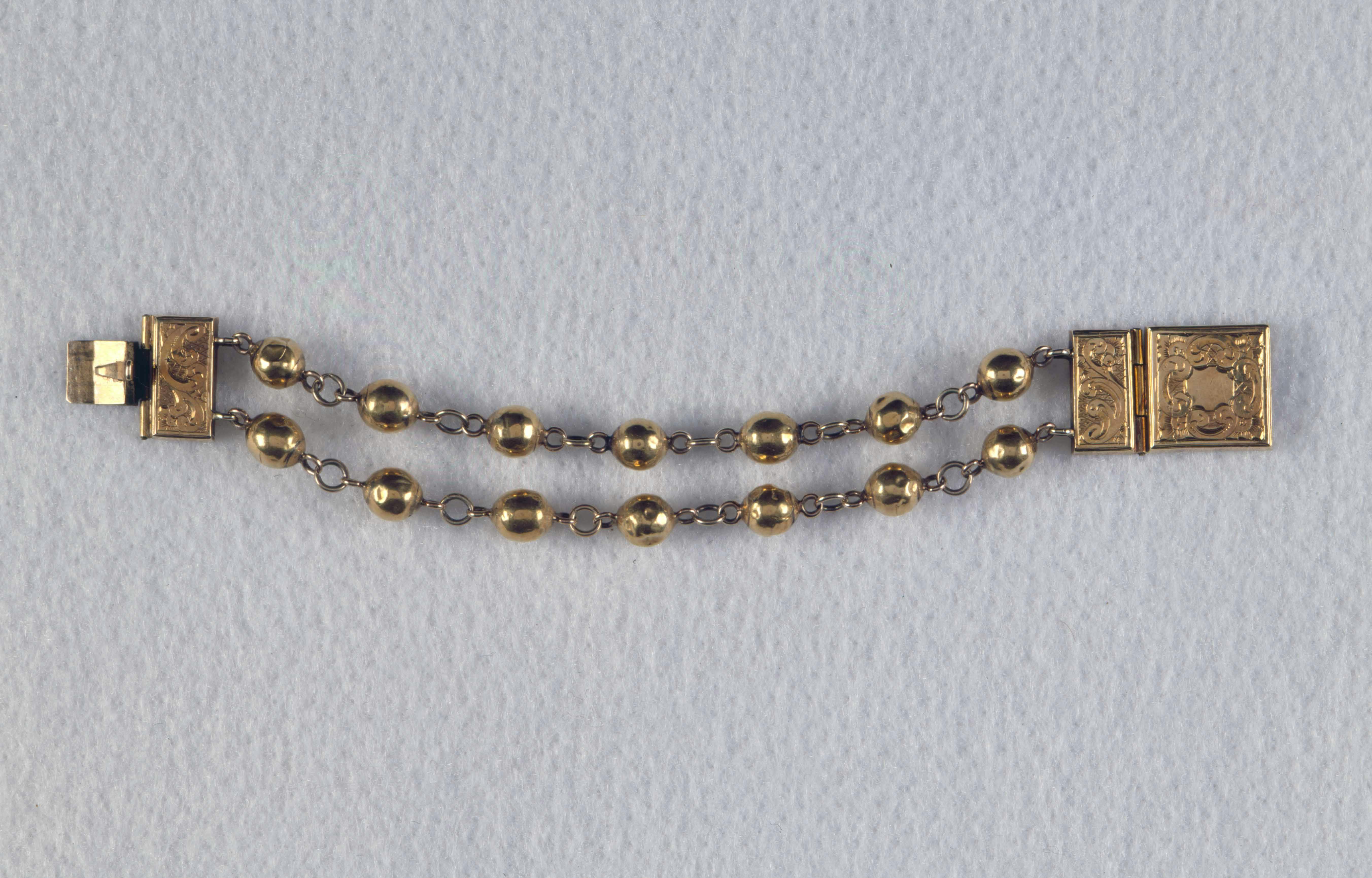 A photo of a silver bracelet of Elizabeth Freeman.