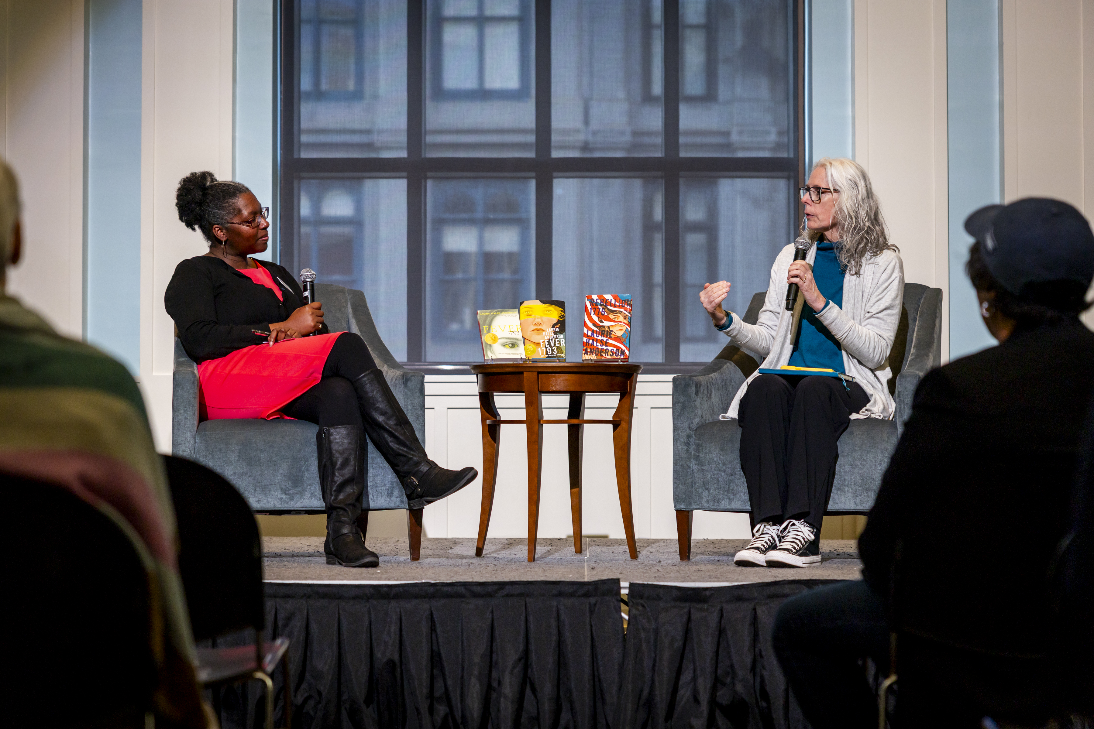 Director of Education and Community Engagement Adrienne G. Whaley and author Laurie Halse Anderson onstage