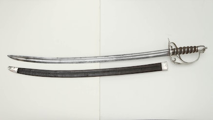 This image shows a Sword and British Officers Saber.
