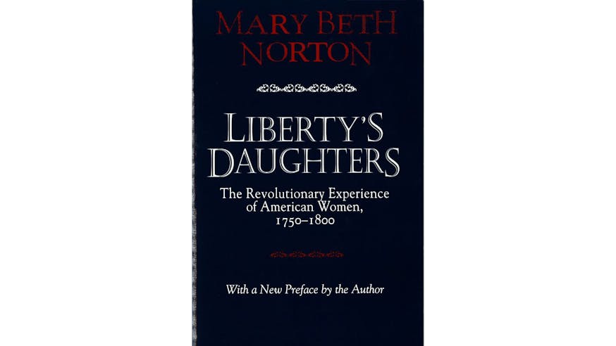 The image shows the book cover of Liberty's Daughters: The Revolutionary Experience of American Women, 1750-1800 by Mary Beth Norton. It is a blue cover with Mary’s name written in red font at the top of the image. The title of the book is written in white font in the middle of the image.
