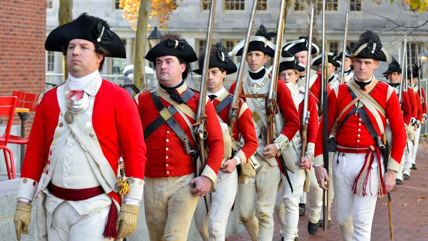 British red coats march past the Museum up Third Street as part of Occupied Philadelphia.