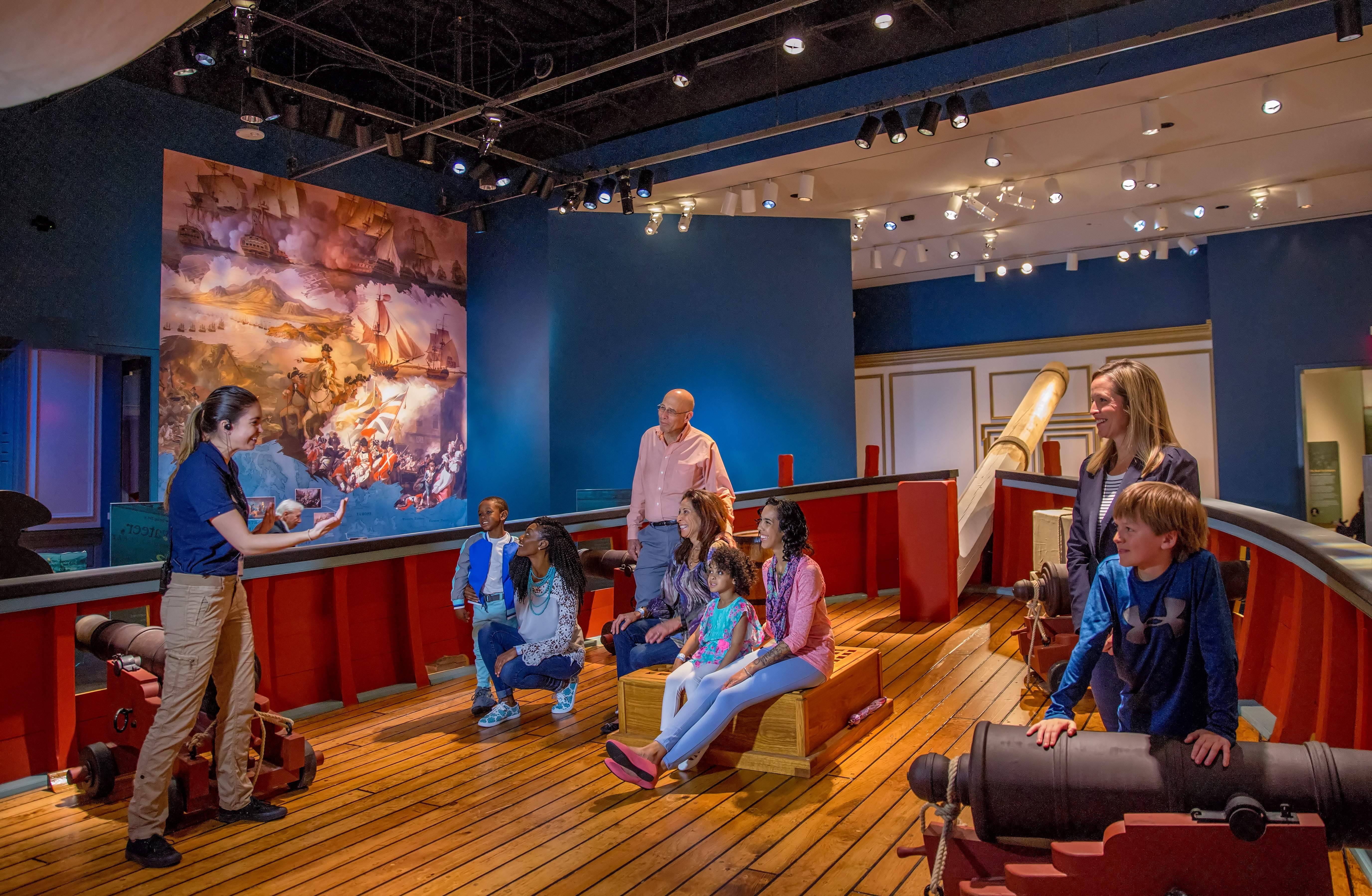 A Museum educator talks to a group