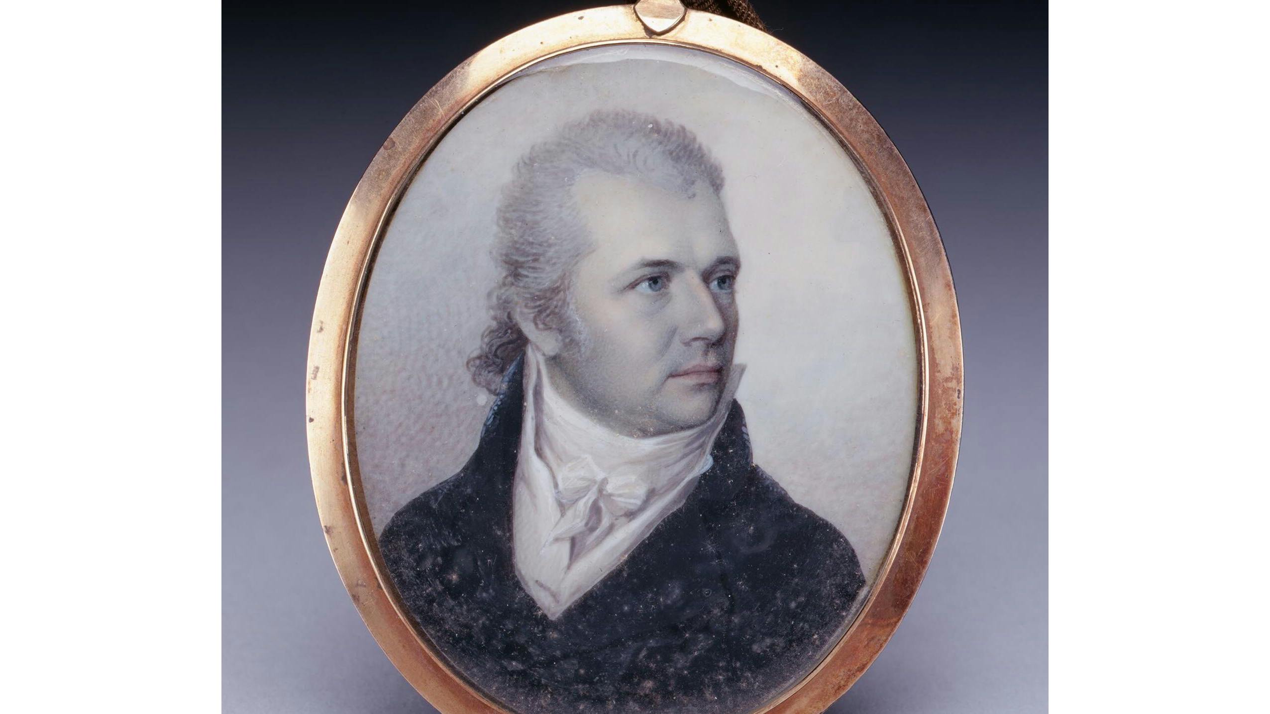This small grayish miniature portrait depicts John Louis Taylor looking to his left wearing a black coat and when shirt.