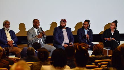 From left to right, Stephen Bradley, Derek Green, Kurt Evans, Jason Coles, and Nia Eubanks sit on a panel about Black entrepreneurship in Philadelphia.