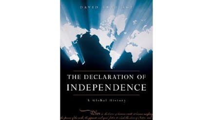 This image depicts the book cover of The Declaration of Independence: A Global History by David Armitage. The cover is black and a map of the world is illuminated in a white, shining light.