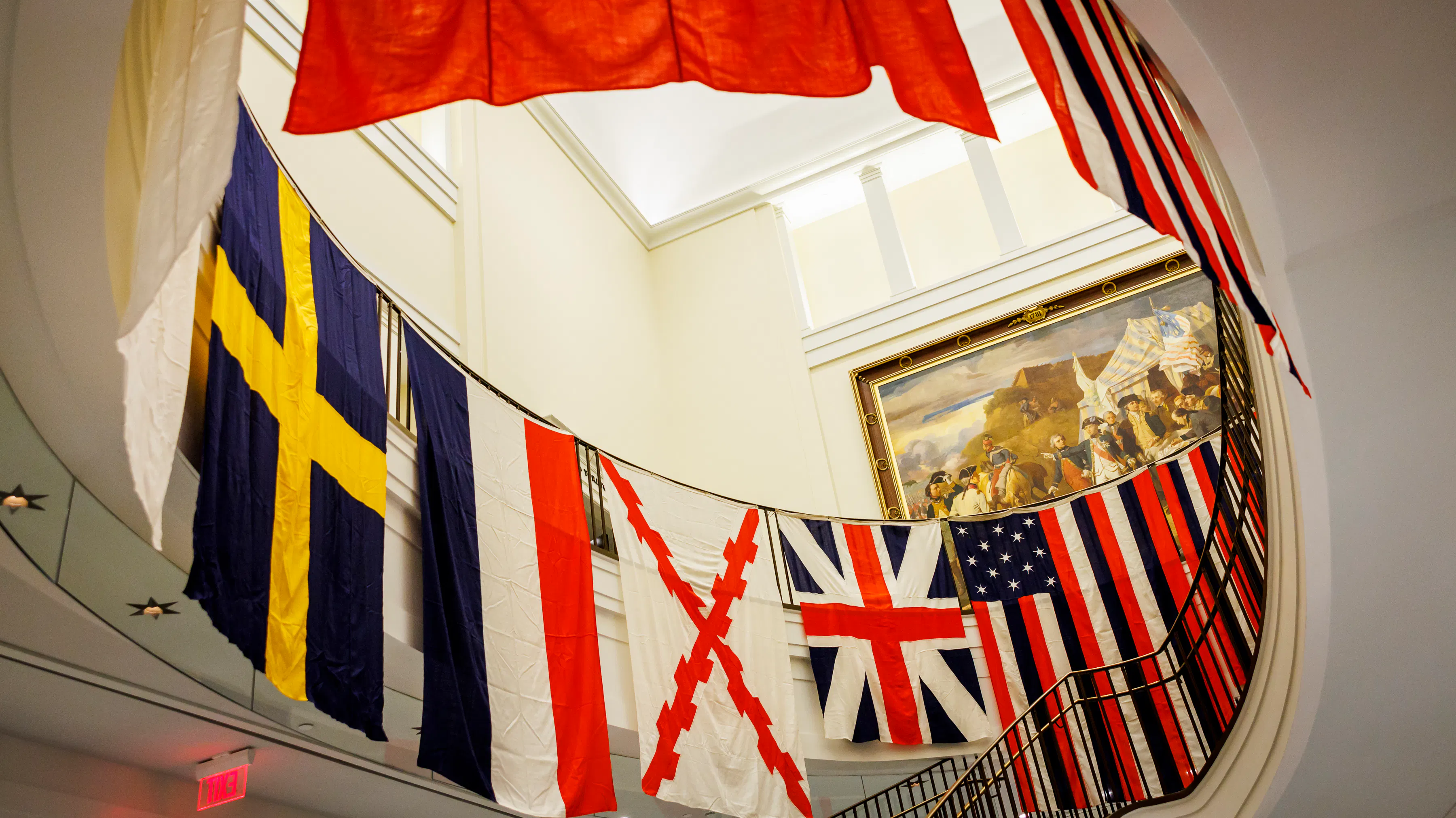True Colours Project flags hanging in a circle the Museum
