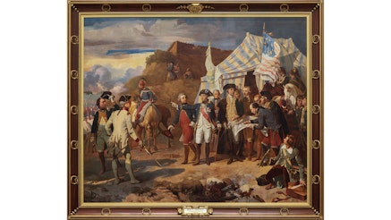 This image shows The Siege of Yorktown painting. The frame is brown with circular gold symbols. It says “1781” at the top of the frame.