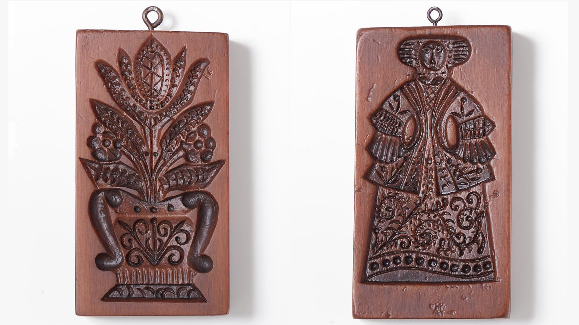 The front and reverse of a wooden cookie board