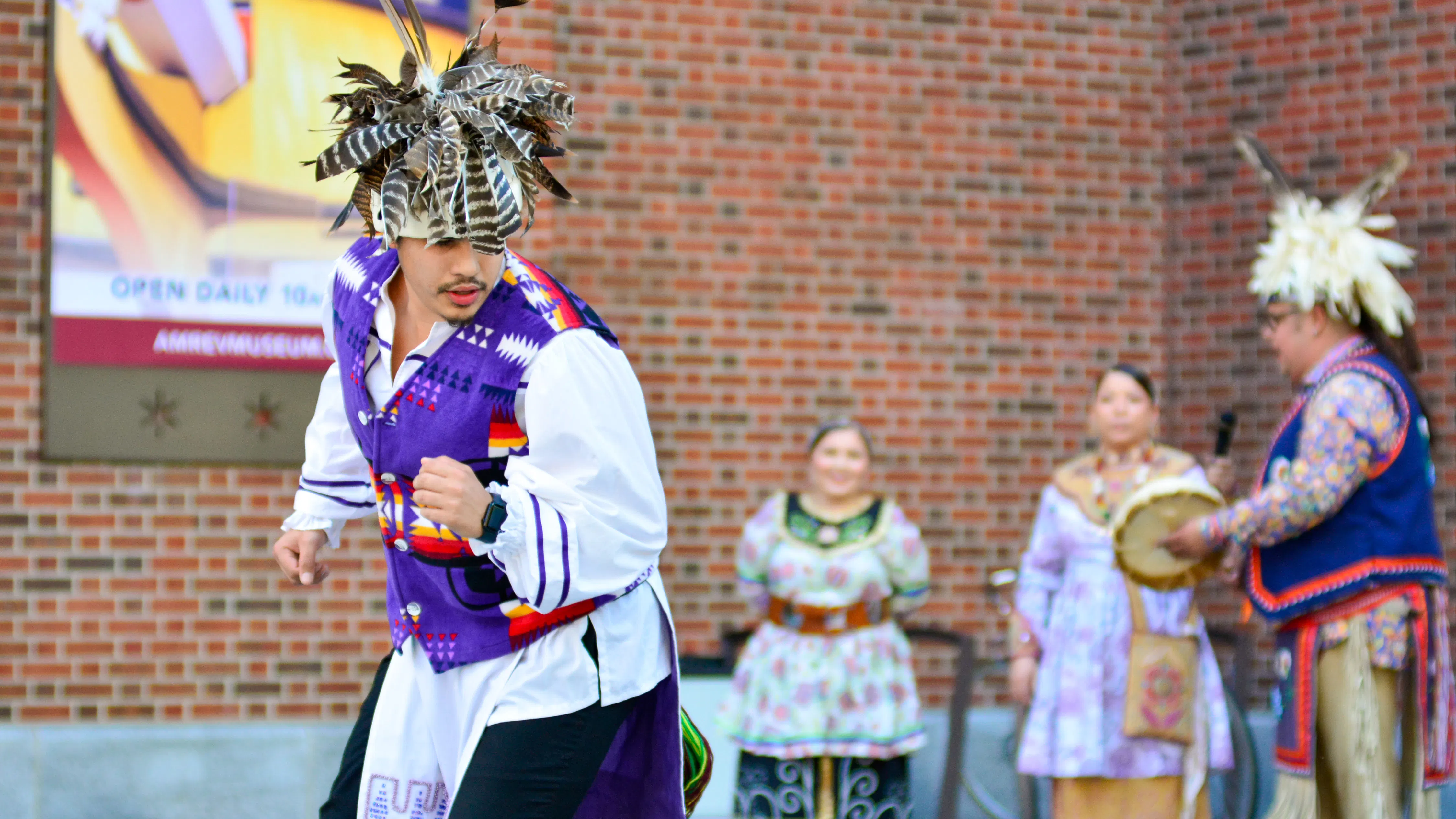 A dancer performs traditional Iroquois social dances on the Museum plaza.