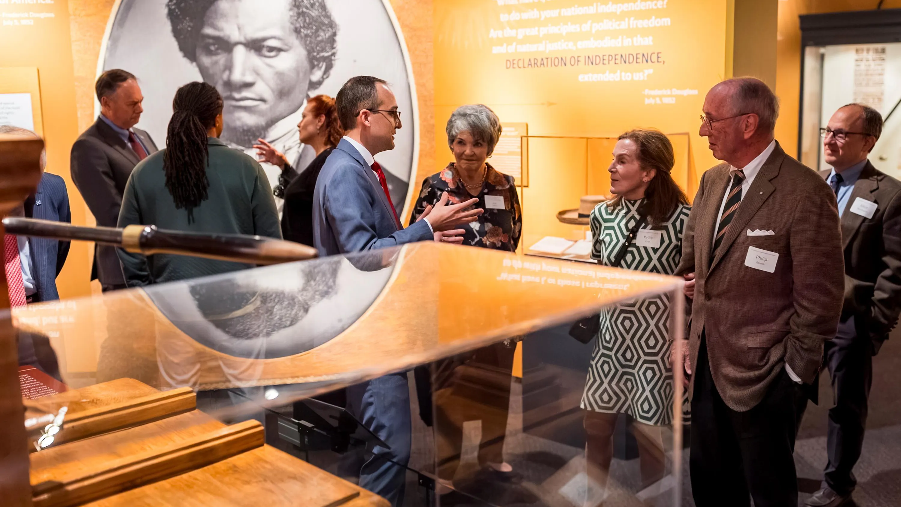 A group of people talk in "The Declaration's Journey"