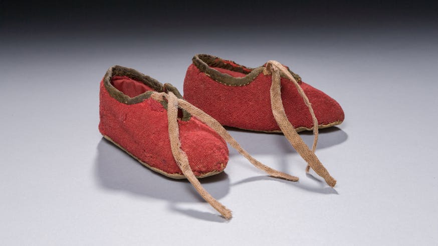 These red baby booties belonged to the family of James Davenport.