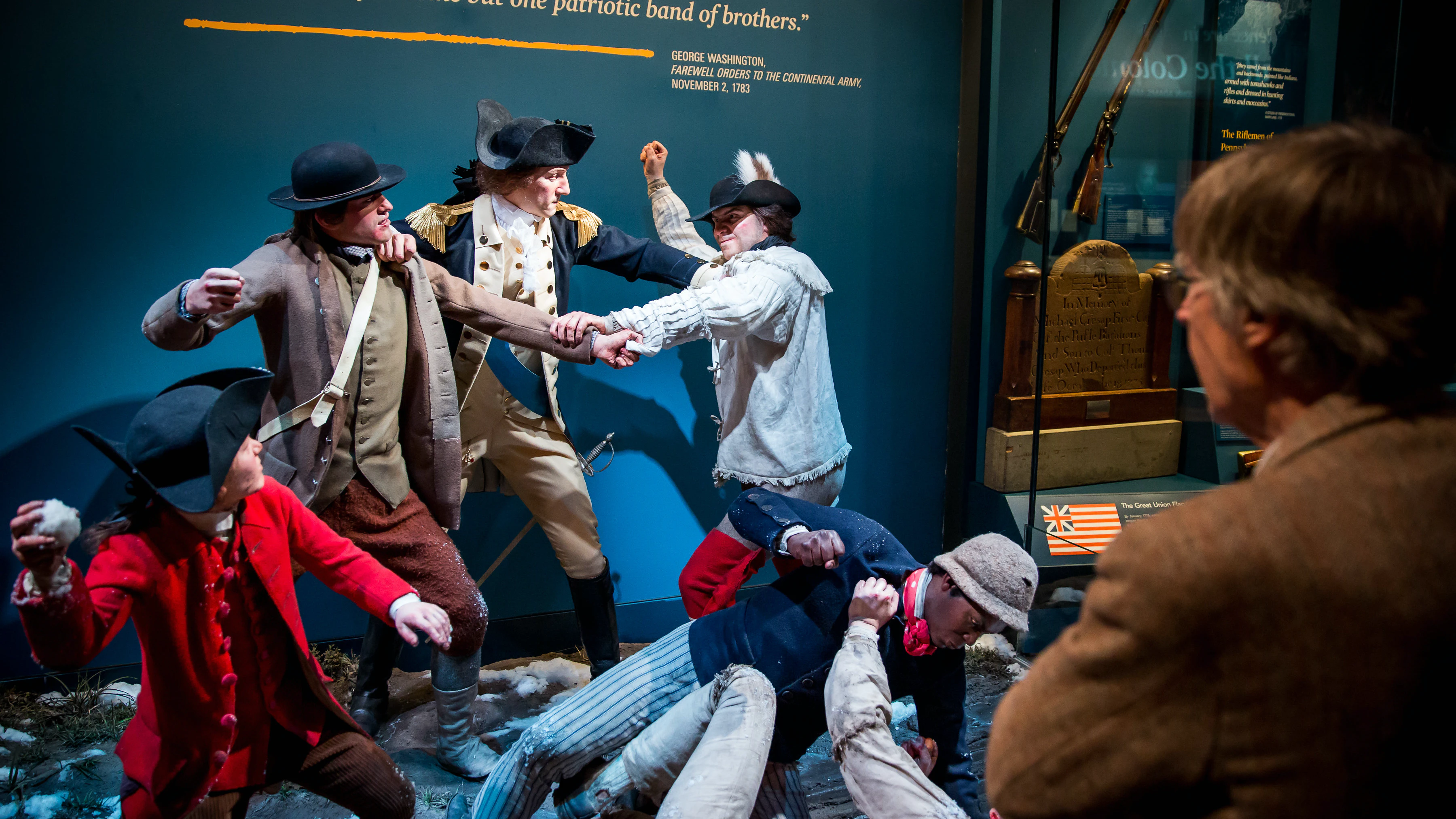 A tableau of figures fighting in colonial clothing