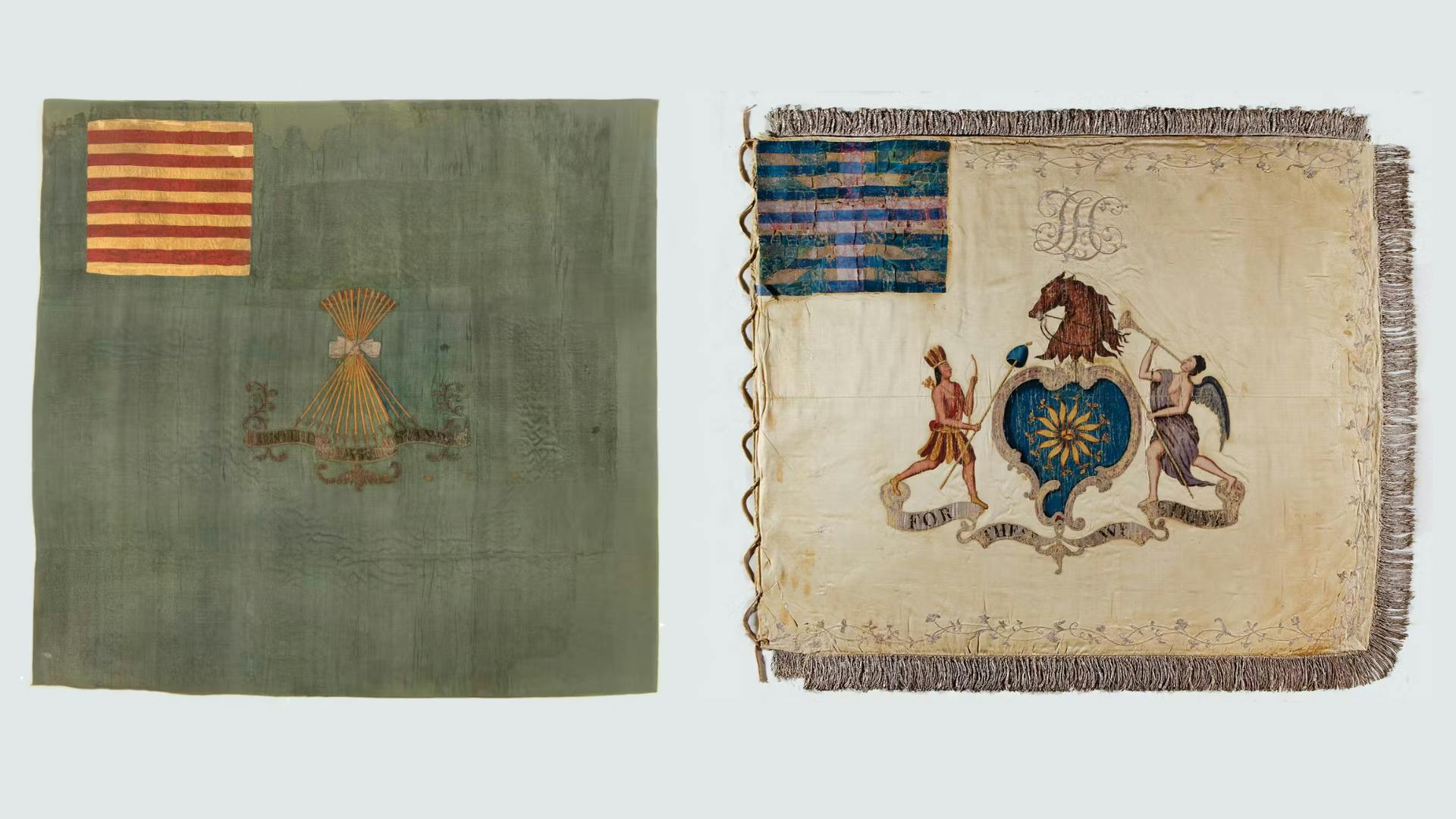 Two Revolutionary War flags, side by side on a gray background.